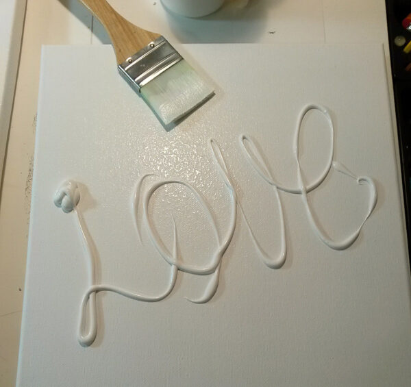 every piece of art starts with love. Brush on gesso with love.