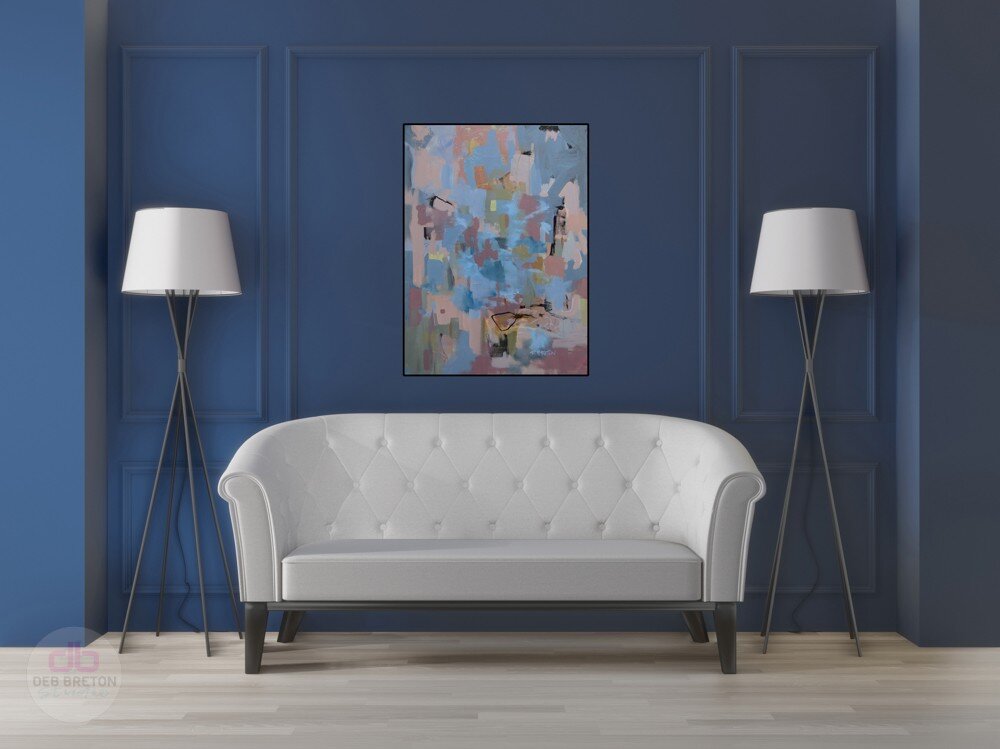 Beautiful original painting of a modern abstract in blue and green colors, hanging in a living room